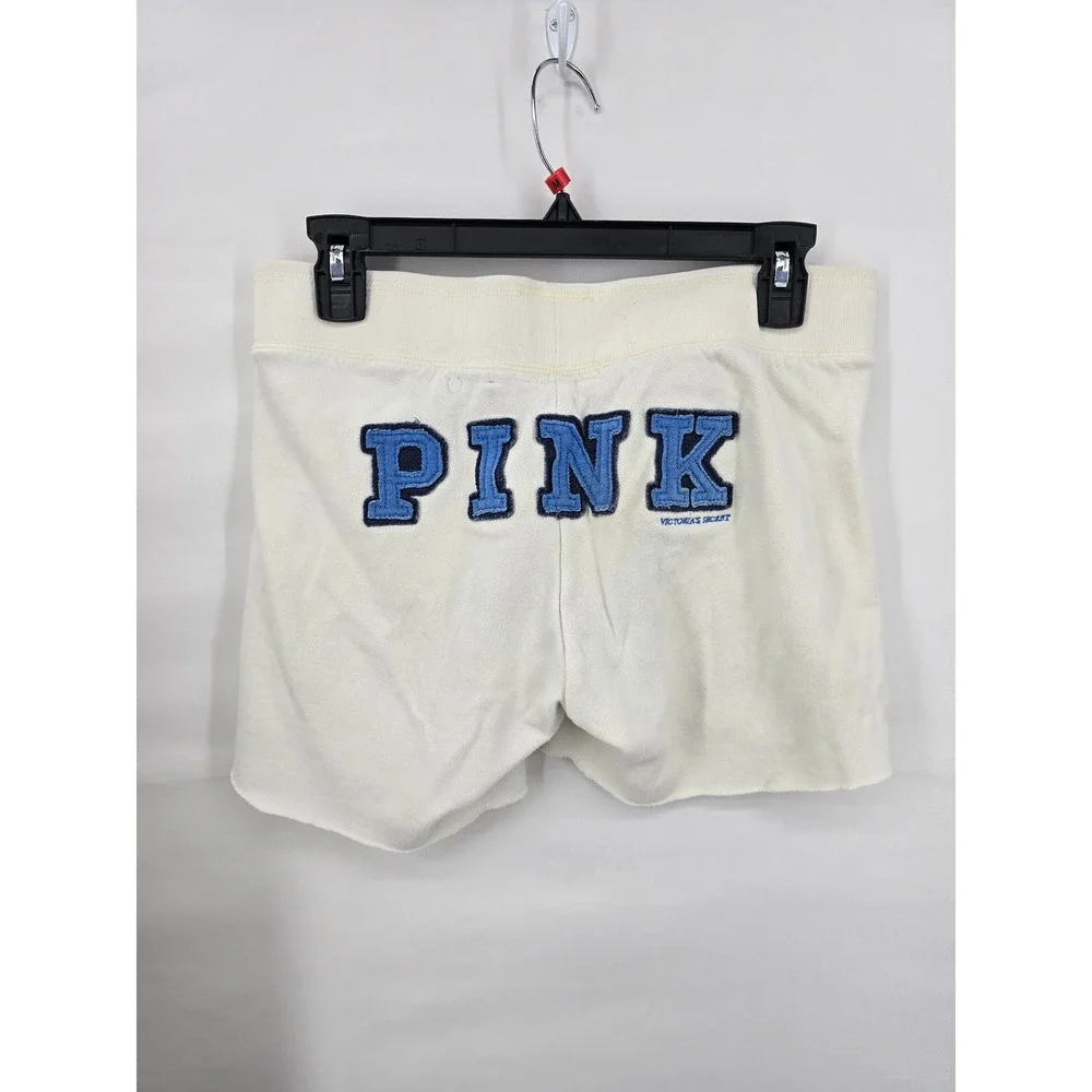 Victoria's Secret PINK Sweat Shorts Cream Blue Logo Raw Hem XS Collegiate Crest